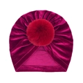 Detailed view of dark red velvet baby beanie with matching faux fur pompom top - One Size / Burgundy