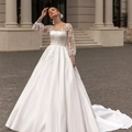 Elegant white satin wedding dress with long lace sleeves and cathedral train finish - US 2 / Pure White