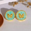 Detail of vintage French enamel butterfly stud earrings with gold metal frame - Blue