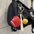 Three-piece baseball keychain with red glove, yellow ball and bat on a black backpack - 2CM Yellow Ball Long Bat Red Glove
