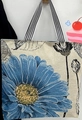 Off-white canvas tote bag featuring large blue floral prints and striped handles - Blue Floral
