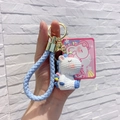 Porte-clés licorne bleue avec lanière tressée et pendentif 3D en résine blanche - Bleu