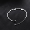 Silver star and moon stainless steel bracelet with cubic zirconia on black silk - Silver Moon Star