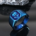 Close-up of deep blue skull ring with high-gloss finish and textured relief on dark background - US 7 / Blue