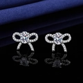 Silver bow stud earrings with oval moissanite stones and zircon accents for women - White Diamond Bow Earrings Led-137