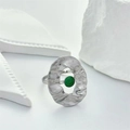 Detail of silver stainless steel ring with hammered design and green gemstone inlay - Adjustable Open / Silver