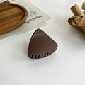 Detail of matte dark brown triangular hair claw clip on a minimalist aesthetic background - Triangle / Dark Coffee