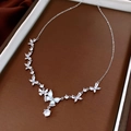 Detailed view of silver butterfly necklace with sparkling zircon and mother of pearl inlay - Necklace - Silver