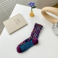 Floral knit crew socks in navy blue with purple accents and 3D textured flower patterns - One Size / Purple