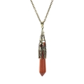 Close-up of hexagonal goldstone pendant with vintage bronze hollow pattern chain - Antique Bronze + Goldstone