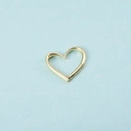 Golden heart-shaped hollow connector charm for DIY necklace jewelry making on blue backdrop - Gold Single Heart Pendant