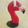 Hand-carved red flamingo wooden glasses holder with textured finish on black base - Red Flamingo