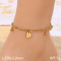 Golden heart charm anklet in stainless steel shown on ankle with beach backdrop - Gold Heart Style (KJ4481-Z)
