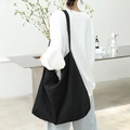 Minimalist black canvas tote bag for women, large capacity shoulder bag in solid black - Black