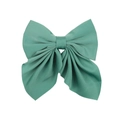 Detail of a large green bow hair clip with textured fabric and elegant 3D ribbon folds - Green