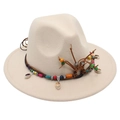 Detail of cream fedora hat with ethnic beaded leather band and bohemian ornaments - Off White