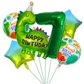 Detail view of 7th birthday dinosaur party kit with green foil balloons and stars - Dino Birthday Set 7