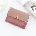 Pink patchwork trifold mini wallet with gold V-metal buckle on a textured faux leather surface - Rose Red