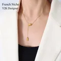 Collana in acciaio inossidabile placcato oro 18k con ciondolo Lucky e perla dorata francese - Oro