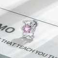 Silver bear stud earring featuring a pink star-shaped zircon and minimalist metal frame - Pink