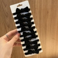 Set mit 10 schwarzen elastischen Haargummis mit Schleifen auf einer Displaykarte - Verdickte Bogen Haargummis (10 Stück/Packung, Schwarz)