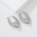 Detailed view of silver polished stainless steel geometric earrings on stone base - 1175 Silver (Fan Stacked)