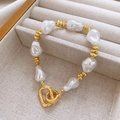 French baroque pearl bracelet with gold spacers and heart clasp on a jewelry tray - 84# Bracelet-Gold-Geometric