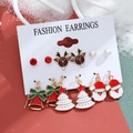 Christmas stud earring set featuring reindeer, bells, and Santa motifs on display card - Model 10 A-1400