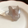 Adjustable silver stainless steel cuff bracelet featuring a triple ginkgo leaf design - Silver