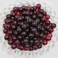 Macro shot of 4-8mm deep red glass beads in a glass bowl for DIY jewelry making - 4mm / Vermilion