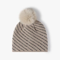 Striped winter knit beanie for women in beige with a fluffy faux fur pompom and silver glitter - Khaki