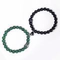 Detail of magnet heart clasp connecting matte black and turquoise beaded couple bracelets - Malachite And Matte Stone