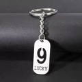 Lucky number 9 stainless steel keychain with minimalist engraving on a black surface - Number 9