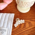 Elegant transparent hair claw clip with gradient faux pearls on a warm wooden surface - No. 3 Five Pearls Small 4.5cm