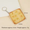 Realistic PVC soda biscuit keychain with cream carving and silver metal keyring - Square Cracker - Keychain Style