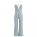 Light blue jumpsuit with rhinestone halter straps and stylish flare leg silhouette - L / Blue
