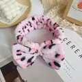 Pink leopard print bow headband in soft coral fleece for facial washing and makeup - Pink Leopard