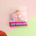 Pink crown birthday candle with Happy Birthday text in transparent retail box - Pink Letters Happy Birthday Candle