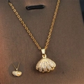 Gold shell pendant necklace with sparkling pavé crystals and an inner white pearl - Gold - Shell Pearl