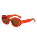 Retro-Oval-Sonnenbrille mit rotem durchsichtigem Rahmen und braun getönten Gläsern - Transparent Orange Tee Gläser