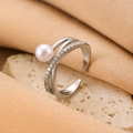 Elegant silver bow-shaped open ring featuring a white pearl and shimmering crystals - Silver Pearl Double Ring (Z-533)