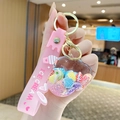 Pink heart liquid glitter keychain with shell candy charms and ice cream wristlet strap - Quicksand Shell - Cloud