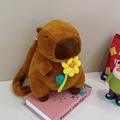 Cute Capybara brown plush backpack holding a yellow flower for school or travel - 35cm / Yellow Flower Capybara