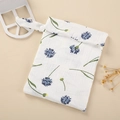 Detail of soft cotton muslin organizer bag with blue cornflower print and snap closure - Blue Dandelion