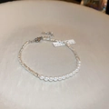 Macro shot of French luxury bracelet featuring white pearls and silver textured metal chain - 68# Bracelet-Two Tone-Half Pearl Half Silver Chain