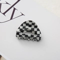Macro shot of stylish black and white checkerboard hair claw clip with smooth glossy finish - Black & White Small Checkerboard 4.5cm