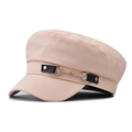 Detailed close-up of beige sailor hat featuring black leather strap and golden heart buckle - One Size / Beige