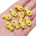 Gele keramische viskralen met witte stippen voor DIY sieraden maken en hobby's - Donkergeel
