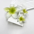 Three-piece plumeria flower hair claw clip set with white and green gradient finish - White Background With Green Core (including Cards)