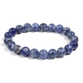 Natural blue sodalite beaded bracelet with unique marble textures on white background - Blue Sodalite / 4mm